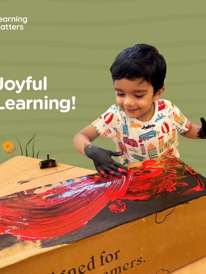 With hands protected by gloves, a child who is hesitant about messy textures can still engage. This simple adaptation allows them to experience the joy of painting on a large scale, building their confidence one step at a time.