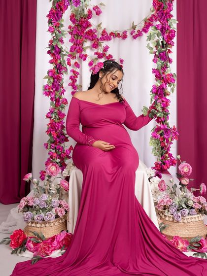 A duplicate of ID 68, this portrait is full of color, life, and the joy of motherhood.