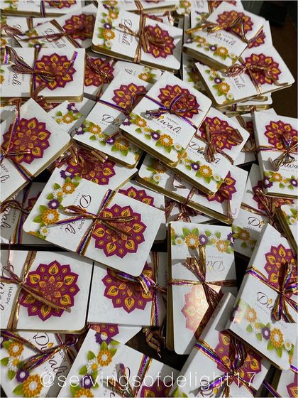 A whole batch of Diwali chocolate books, tied with colorful ribbons and ready to be delivered. I love seeing so many orders go out!