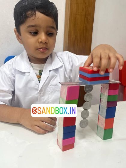 This young physicist is testing the limits of his magnetic structure. These experiments encourage critical thinking, patience, and a deeper understanding of magnetic forces.