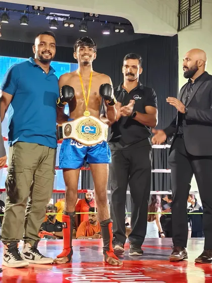 In the ring with my champion after he won the title belt at the 2024 AIMMAF event in Siliguri.