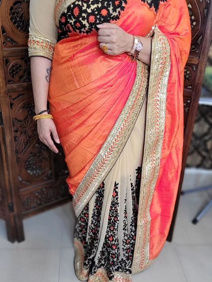 The full look of the open pallu draping. This style is ideal for designer sarees where the pallu has heavy embroidery or a distinct pattern.