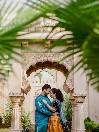 Framed by the timeless beauty of heritage architecture, the couple shares an intimate moment. This pre-wedding shoot highlights how I use stunning locations to create a royal and romantic backdrop for your love story.
