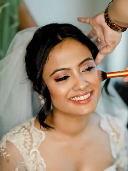 It's all about collaboration and having fun. Here I am adding the final touches of blush to this beautiful bride for her Goa wedding. Creating a relaxed and happy atmosphere is just as important as the makeup itself, ensuring you feel comfortable and joyful.