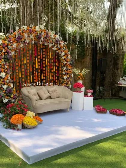 I believe pre-wedding functions should be just as spectacular. This vibrant Mehndi backdrop uses a bold palette of marigolds and mixed florals to create a joyful and photogenic space, perfect for celebrating with color and tradition.