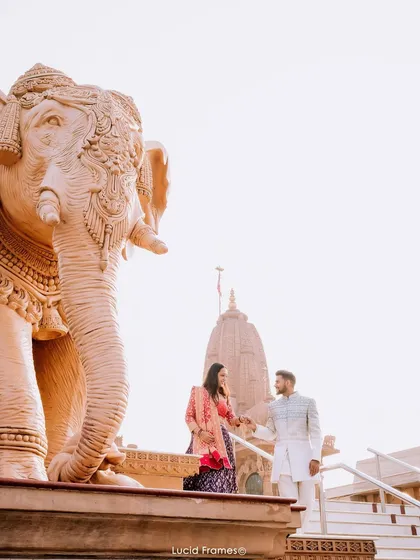 A majestic temple provides a stunning backdrop for this couple's portrait. We specialize in incorporating grand architecture into our destination pre-wedding photography.
