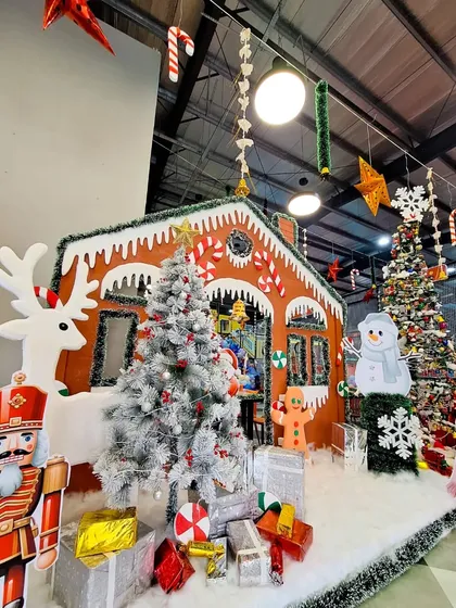 A close-up of our spectacular Christmas gingerbread house display, a favorite photo spot for families during the holiday season.