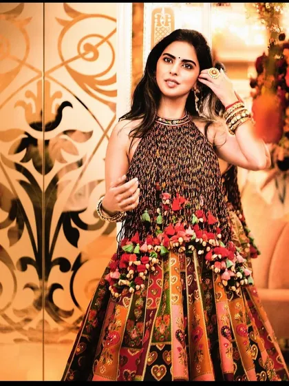 Another angle of the playful and colorful Torani lehenga, showing the floral tassel details on the skirt. It’s these small, thoughtful details that make an outfit special.