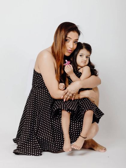 A warm and loving embrace between mother and daughter. These simple, minimalist studio portraits really focus on the emotion and connection, which is what twinning shoots are all about.
