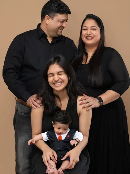 A beautiful multi generational portrait capturing the joy of a growing family. We love bringing everyone together, from grandparents to the newest little member, for a complete family photograph.
