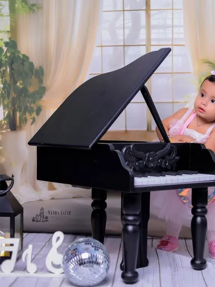 A candid moment of wonder. This photo captures her looking up, creating a sweet and innocent portrait that parents will treasure.