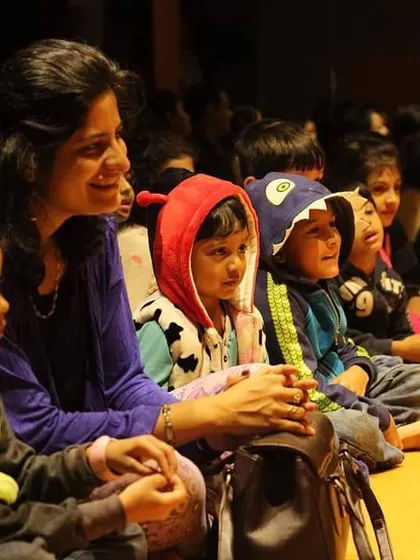 The smiles and focused eyes of the audience say it all. We love seeing adults and children enjoying the show together.