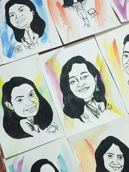 Another angle showing the collection of custom caricatures. This type of art is a fantastic way to make corporate events memorable and personal for employees.