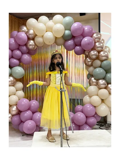 Princess Belle delivers her monologue with grace, bringing a touch of fairytale elegance to the showcase.