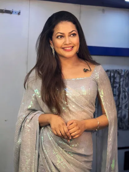 For the Sakal Times "Shahenshah" show, I styled Priyanka Barve in this glamorous silver sequin saree with cape-style sleeves. It's a modern, show-stopping take on the classic saree.