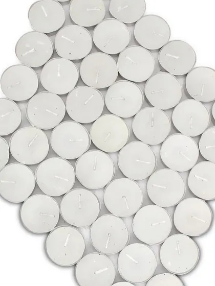 A top-down view of the tealight candles, showing the clean white wax and centered wick, which ensures an even and consistent burn.