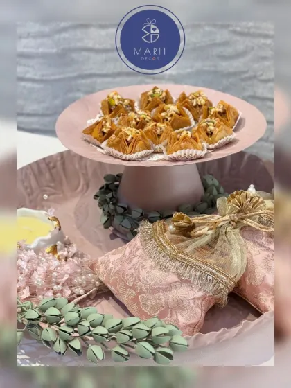 Another angle of my Ghibli-inspired sweet and dry fruit platter. The combination of the textured metal tray, 'potlis', and sweets creates a dreamy, artistic presentation.