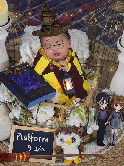 For the family of wizards, I created this magical Harry Potter themed newborn shoot. Complete with a sorting hat, a wand, and a tiny lantern, this little one is ready for Hogwarts. I love bringing your creative ideas to life for a truly unique newborn portrait.