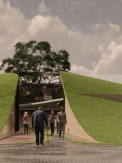The entrance to the conceptual "landscraper" office is designed as a passage through the earth itself. This approach creates a unique arrival experience and reinforces the architectural idea of the building being one with the landscape.
