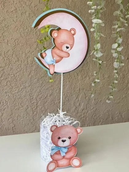 We also create smaller decorative pieces like this cute teddy bear centerpiece with a sleeping bear on a moon cutout.