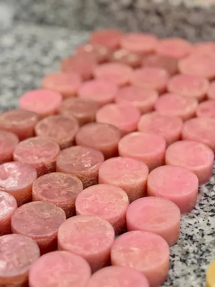 The pink, fruity-berry scented loofah soaps, all lined up and ready for packaging. These were a big hit for the baby shower celebration.