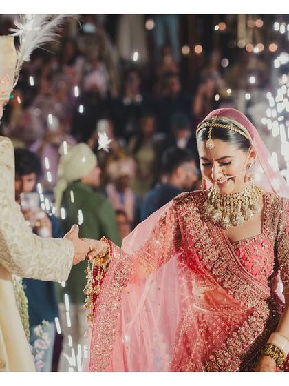 The moment he takes her hand. We ensure the setting is perfect, with guests surrounding them and soft pyro lights adding a touch of magic to this heartfelt tradition.