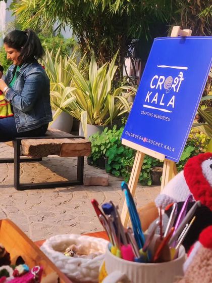 A candid shot from one of my exhibitions, soaking up the winter sun with my Frida doll. My main goal is always to promote this beautiful art form and its benefits.