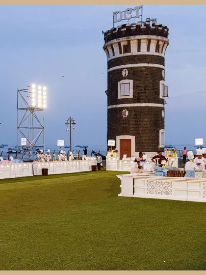 A wide shot of our extensive buffet setup for a large outdoor event. We are equipped to handle gatherings of any scale, ensuring a flawless and impressive presentation every time.