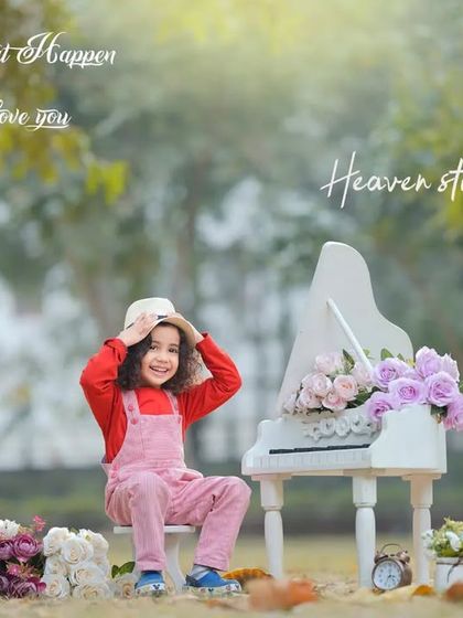 A smile is always in style. This happy portrait from an outdoor session with a miniature piano captures a child's bright and cheerful personality.