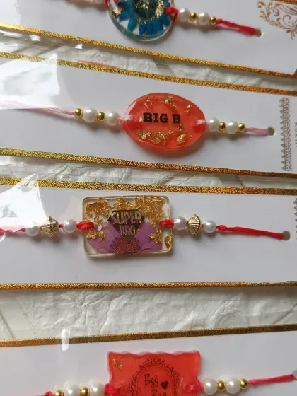 More fun and quirky rakhi designs. From 'Big B' to 'Super Bro', these handmade resin rakhis are a unique way to show your brother you care.