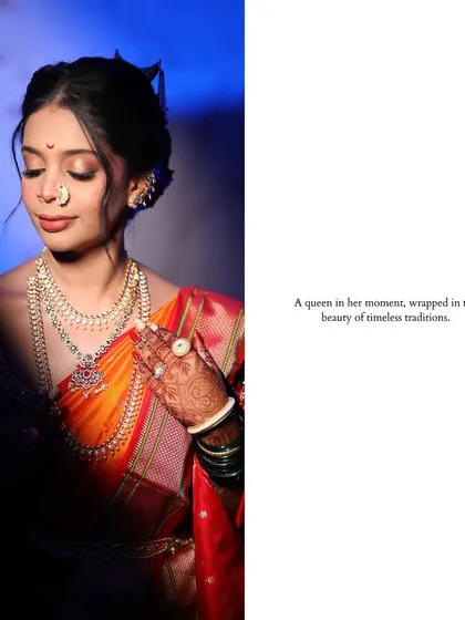 A queen in her moment. This artistic portrait of bride Shweta uses dramatic blue lighting to create a moody and powerful image, highlighting her traditional Maharashtrian jewelry.