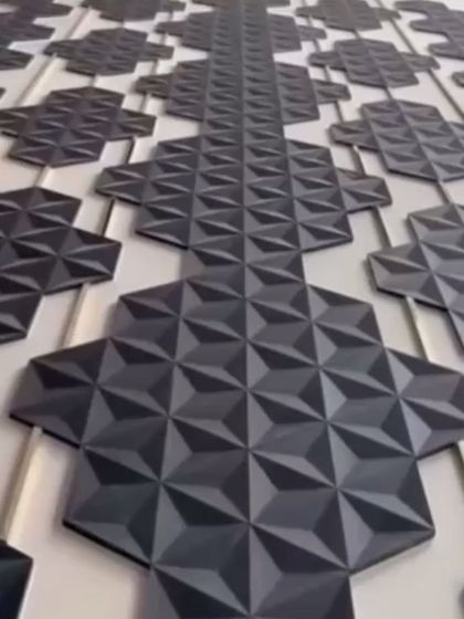 A custom installation of our 3D Magic Tiles. The unique shape allows for creative patterns that can make a wall or floor the centerpiece of a room's design.