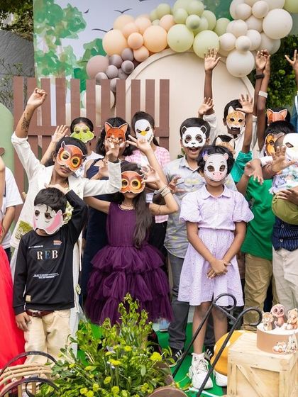 All the little guests having fun with animal masks at Advaith's woodland party, making for a fun and interactive photo opportunity.