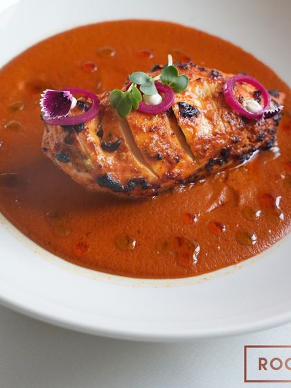 The Stuffed Chicken Breast with Chettinad curry, a dish that brings together flavours from the south of India with a modern plating style. The curry is rich, spicy, and aromatic.