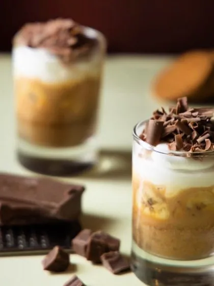 This is the Banoffee Pie of your dreams. Layers of banana, toffee, and cream, topped with chocolate shavings.