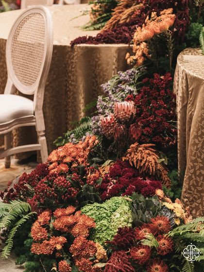 A detail of the cascading floral runner from the 'Orchard of Life' event.