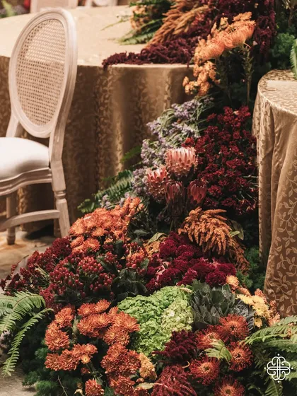 A detail of the cascading floral runner from the 'Orchard of Life' event.