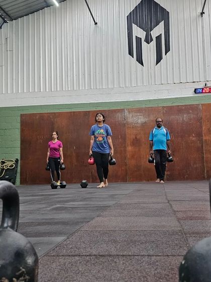 The focus and determination during a carry workout. This is functional fitness at its core.