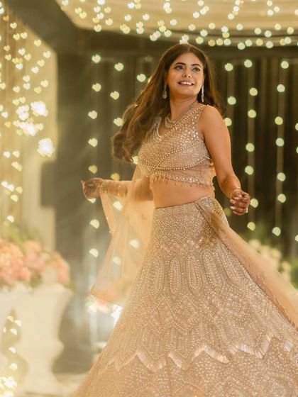 A happy, twirling shot. The makeup is set to last through all the dancing and celebrations of the engagement party.