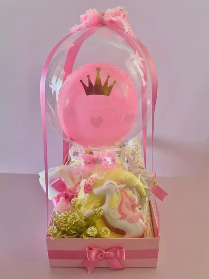 An "It's a Girl" balloon hamper. This special gift is available for delivery in Bangalore only and is perfect for welcoming a new baby.