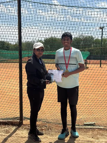 Kshitij Sinha, the runner-up, is awarded his medal and certificate. Our tournaments celebrate all levels of achievement, recognizing the hard work of finalists.