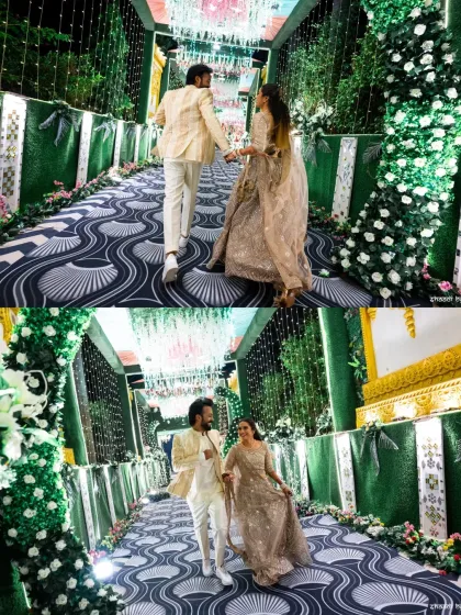 Capturing the couple's joyful energy as they walk through their beautifully decorated Sangeet entrance. These candid walking shots feel natural and full of life.