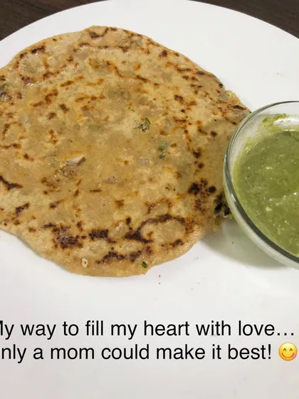 This is a paneer paratha made with love by my mother. I believe that food is a blessing, not something to fear. My plans always include 'wiggle room' for these moments of joy, because a healthy lifestyle must also be a happy one.