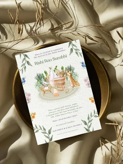 "Tiny yawns and sleepy sighs." A sweet jungle-themed baby announcement to welcome baby Rishi. The design features a lovely illustration of a nursery with a giraffe and bunny, creating a warm and gentle vibe.
