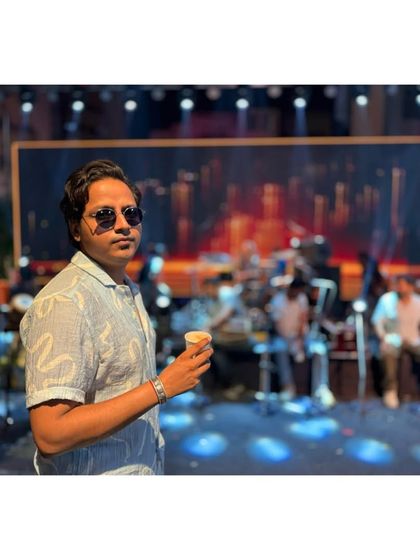 Our vocalist taking a moment before the show. The calm before the musical storm.