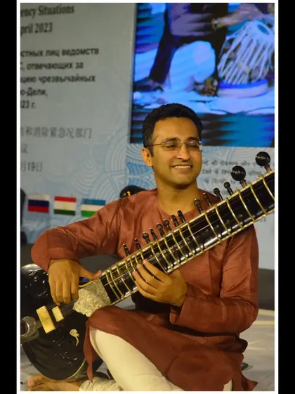 Lost in the melody during a performance for a gathering of international dignitaries. My focus is on delivering a flawless and moving musical experience.