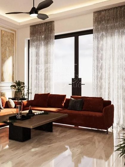 This sunlit living room is part of a vacation home I designed for a family from Kashmir. They wanted a modern space with the warmth of walnut wood, a beautiful reminder of their roots.