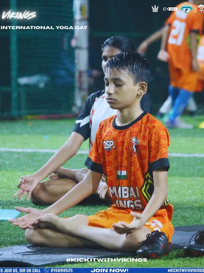 We train the mind as well as the body. A young player finds his focus during a yoga session on the turf.