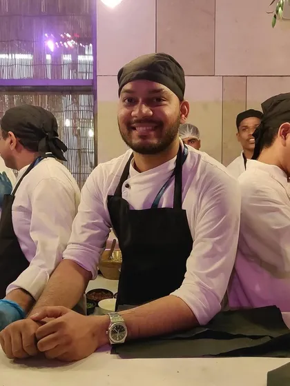 Another shot of Chetan, always ready for service with a smile. He has grown from a boy to a man and a father during his time with us, and we are so proud of him.