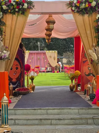 I love creating grand entrances that build excitement. For this Sangeet, we welcomed guests with vibrant drapes, Moroccan lanterns, and fun, oversized character cutouts that brought a playful and festive energy to the event.